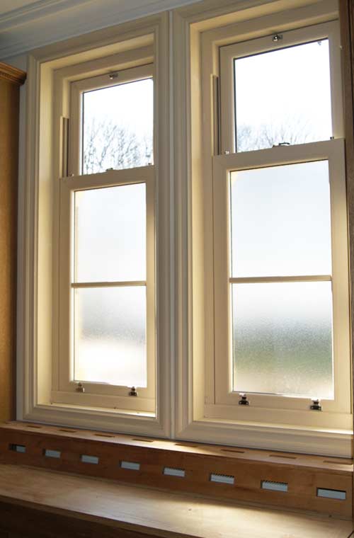 Sash windows with privacy glass