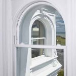 Heritage Rose arched uPVC sash window