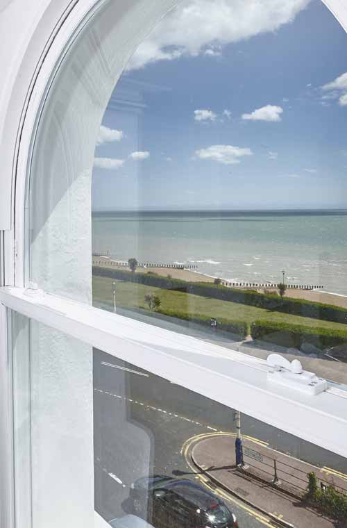 Curved uPVC sash window in white