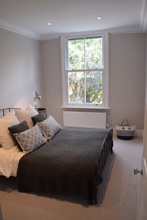 Bedroom inside with sliding sash windows