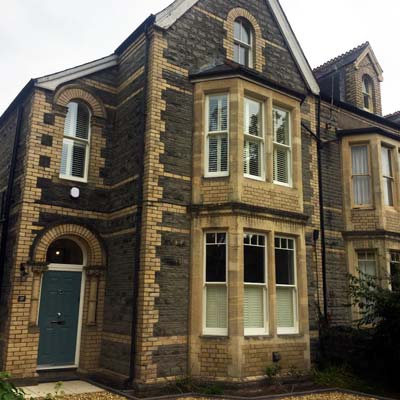 Sash window installation on stone house