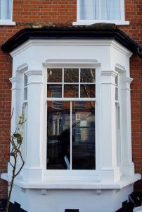 Sliding sash white bay window