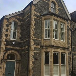 External 2 story sliding sash bay windows