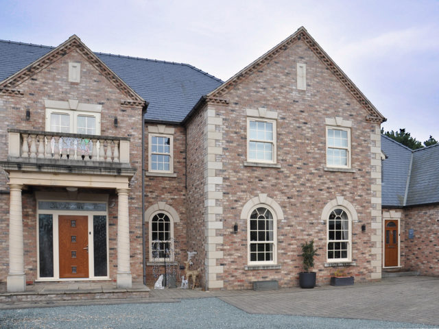 cream arched sash windows
