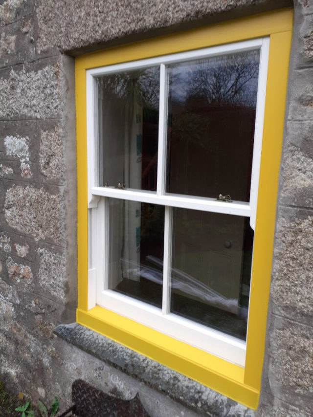 yellow upvc sash window